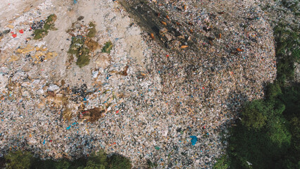 Garbage Vs Nature Stark Contrast. 
Mountains Of Trash Aerial.