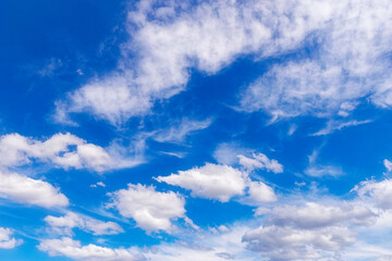 Natural background. White spring clouds