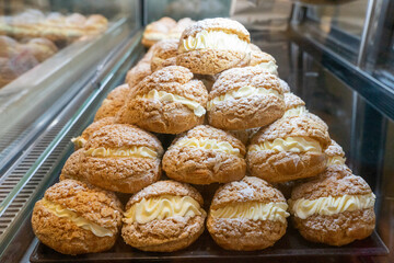Delicious handmade puffs of the day are displayed on the counter