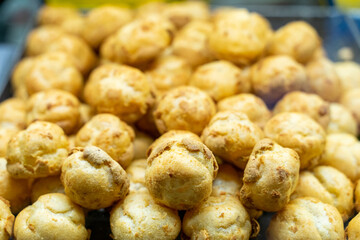 Delicious handmade puffs of the day are displayed on the counter