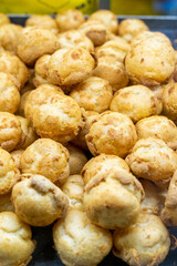 Delicious handmade puffs of the day are displayed on the counter