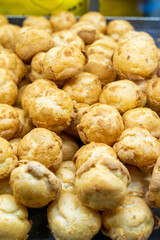 Delicious handmade puffs of the day are displayed on the counter