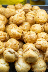 Delicious handmade puffs of the day are displayed on the counter