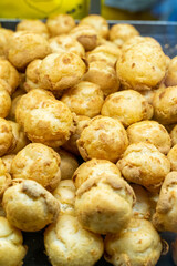 Delicious handmade puffs of the day are displayed on the counter