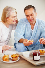 Mature couple, bedroom and food for breakfast, support and nutrition for retirement health. Senior woman, man and croissant or muffin with fruit jam for diet, romance and elderly wellness or hotel
