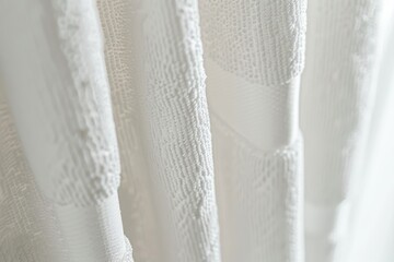 Obraz premium white clean fresh towel fabric texture, folded in waves, hanging in home decor store