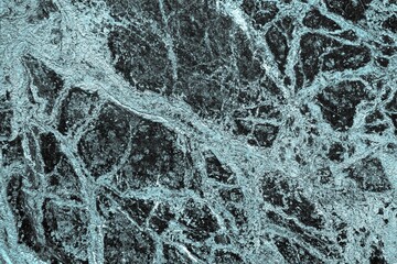 Mur de marbre texturé avec effet bleu opale