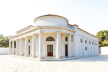 Fototapeta premium White Greek Temple with Columns and Stone Floor