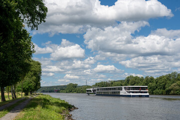 Fototapeta premium A boat on a river with nature and sky