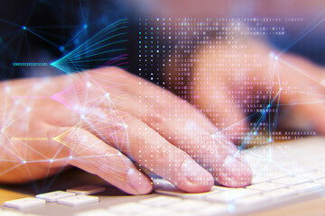 A hand typing on a keyboard with digital network and binary code overlay, symbolizing technology and data processing on a bokeh background