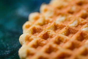 Macro close up shot of a sugar waffle