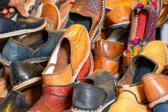 Macro shot showing camel skin sandals called jooti juti jutti popular in punjab, Rajasthan, Jaipur, Jodhpur popular local handicraft