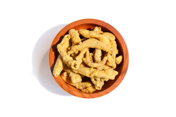 Fried chicken intestines Indonesian food is called usus goreng in a small wooden bowl isolated on white background