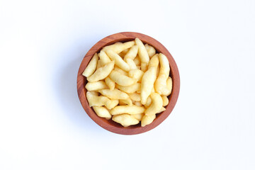 Crunchy Cheese Stick or Cheese Cork Eggs or Telur Gabus Keju or Widaran or Bidaran Keju on small wooden bowl isolated on white background