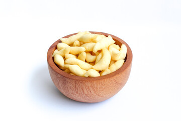 Crunchy Cheese Stick or Cheese Cork Eggs or Telur Gabus Keju or Widaran or Bidaran Keju on small wooden bowl isolated on white background