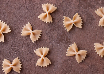 Organic Whole Wheat Farfalle Pasta. Bow Tie Pasta Concept. Top View.