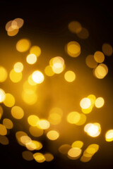 Festive abstract background with bokeh defocused lights and stars