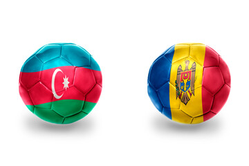 football balls with national flags of moldova and azerbaijan , soccer teams. on the white background.