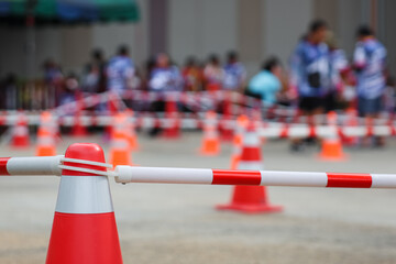 orange Traffic cones and Retractable Cone Bar on track in balance bike racing