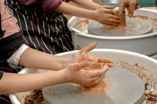 Master class on clay modeling on a potter's wheel. Craft lessons