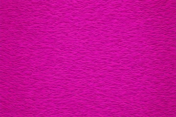 Fototapeta premium A pink background with a pattern of squares