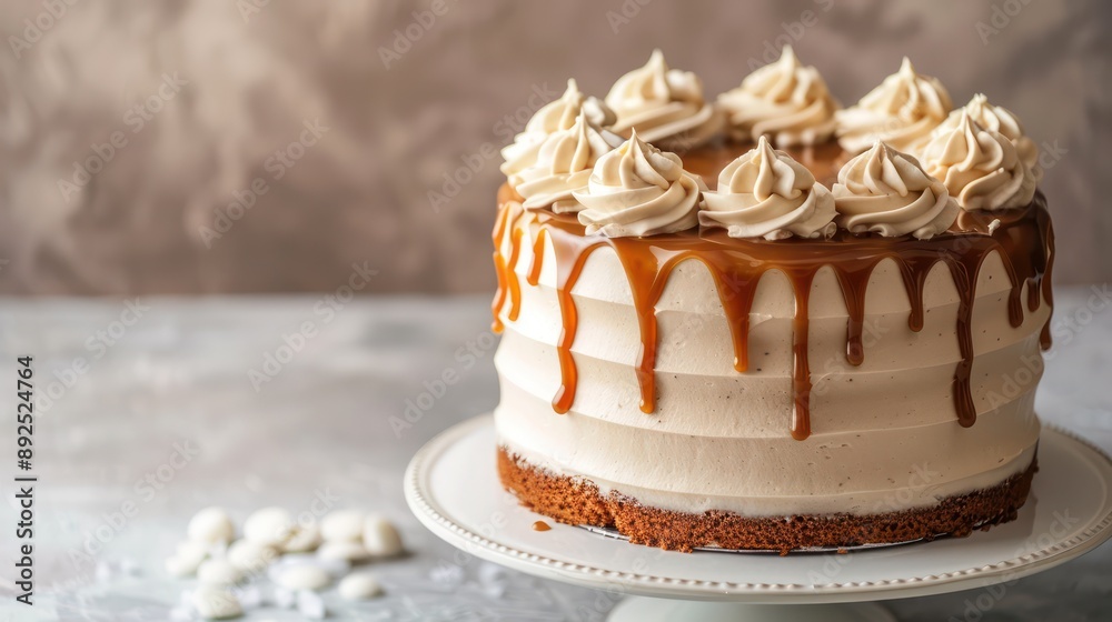Fototapete modern salted caramel drizzle cake on a soft dove gray background, chic and inviting for minimalist 