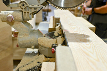 Wood wooden modular houses made of timber yellow board saw processing hands nail grind