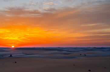 sunset sunrise with beautiful cloud color in the desert sand dune.