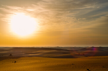 sunset sunrise with beautiful cloud color in the desert sand dune.