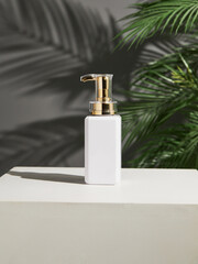 Obraz premium a white jar of cosmetics on a gray background