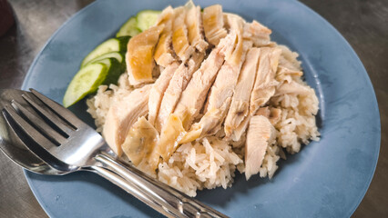 Chicken rice on a plate in a restaurant