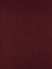 Velvet texture background with deep red tones