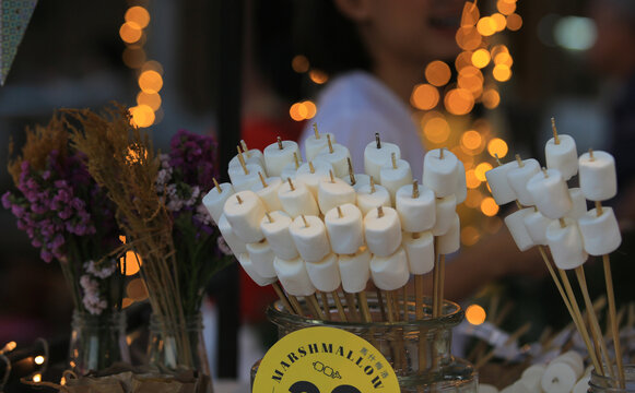 Marshmallow with stick for bbq on sale in market at Bangkok