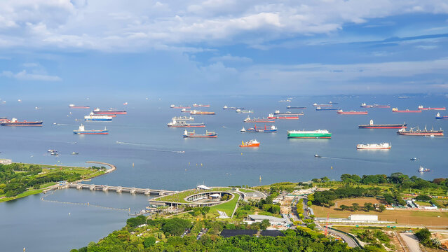 Aerial View Of Marina Barrage And Ships On The Ocean, Singapore.