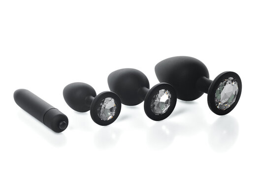 four mismatched silicone black anal plugs with crystals