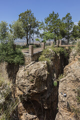 Obraz premium The ruins of a castle on top of a small hill south of the town of Mijas. Mijas, Costa del Sol, Andalusia, Spain.