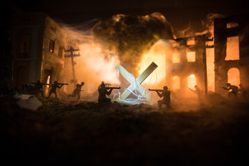 Concept of war or manipulation with global politics. The puppeteer controls soldiers. Night battle...