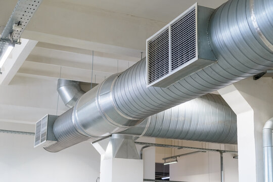 Indoor air duct in the factory in the workshop with air holes