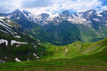 Fototapeta premium Grossglockner high mountain road in Austria. Mountains and green forests. Landscape with nature in the Alps. A great place for sports, recreation and outdoor activity holidays. 