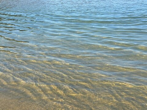 Sea gentle waves on the beach