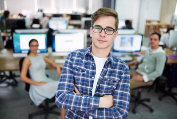 Portrait, arms crossed and creative man confident, employee or agency with glasses, coworking and business. Office, graphic designer and opportunity to learn for intern, proud and person in startup