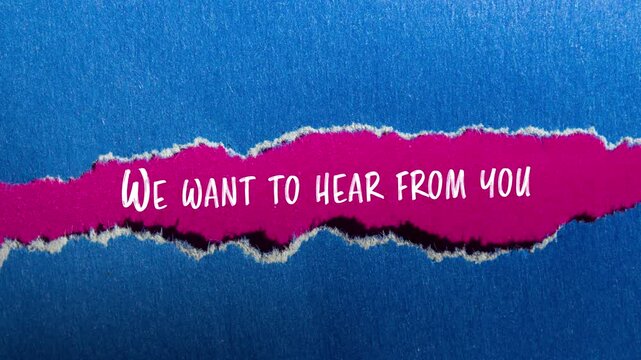 We want to hear from you message writing on ripped torn blue paper with pink background