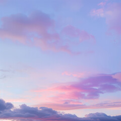 Soft pastel hues of pink and blue sky with distant fluffy clouds.