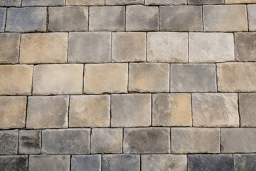 Obraz premium Processed collage of ancient yellow block wall texture. Background for banner, backdrop or texture