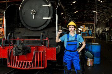 Engineer checking construction process railway and checking work on railroad station . Railway...