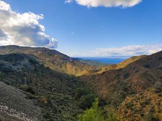 beautiful landscape of rocky mountains and cloudy sky