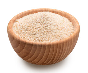 Manioc or cassava flour in wooden bowl on white background. File contains clipping path.