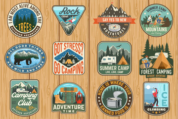 Obraz premium Set of Rock Climbing club and summer camp badges. Vector. Concept for shirt or print, stamp, patch. Vintage typography design with camping tent, trailer, camper, climber, carabiner and mountains.