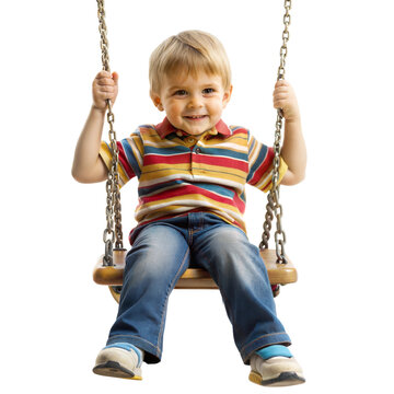 Little boy joyfully swinging on a swing set