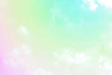 Pastel sky purple pink yellow green blue with white cloud. Fantasy background. Summer Spring backdrop. Beautiful colourful nature sky.